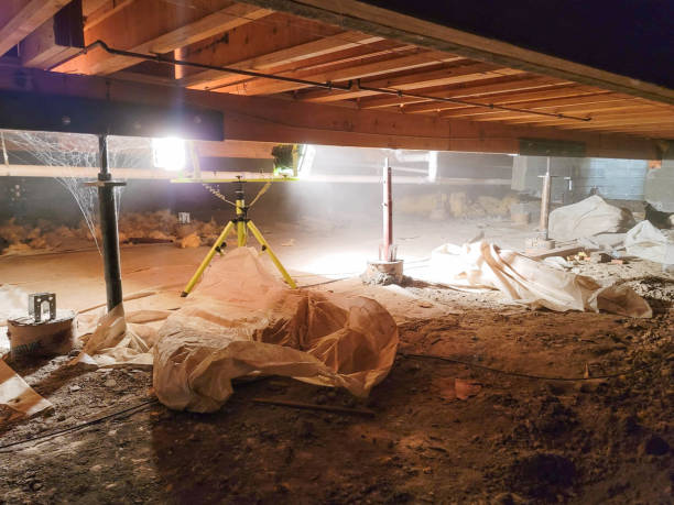 A cleanup of the vapor barrier in a crawlspace